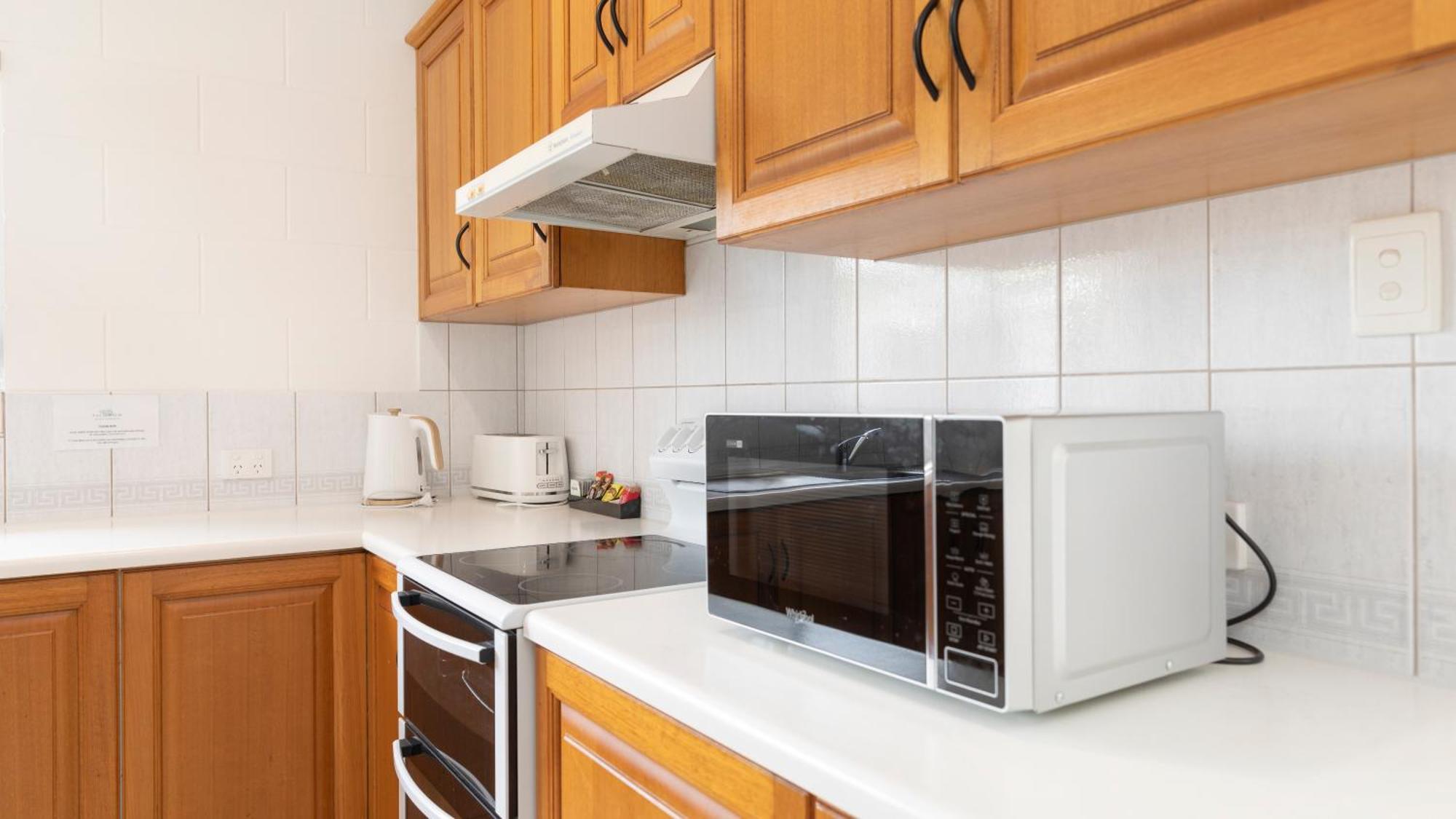Palm View Holiday Apartments Боуен Стая снимка